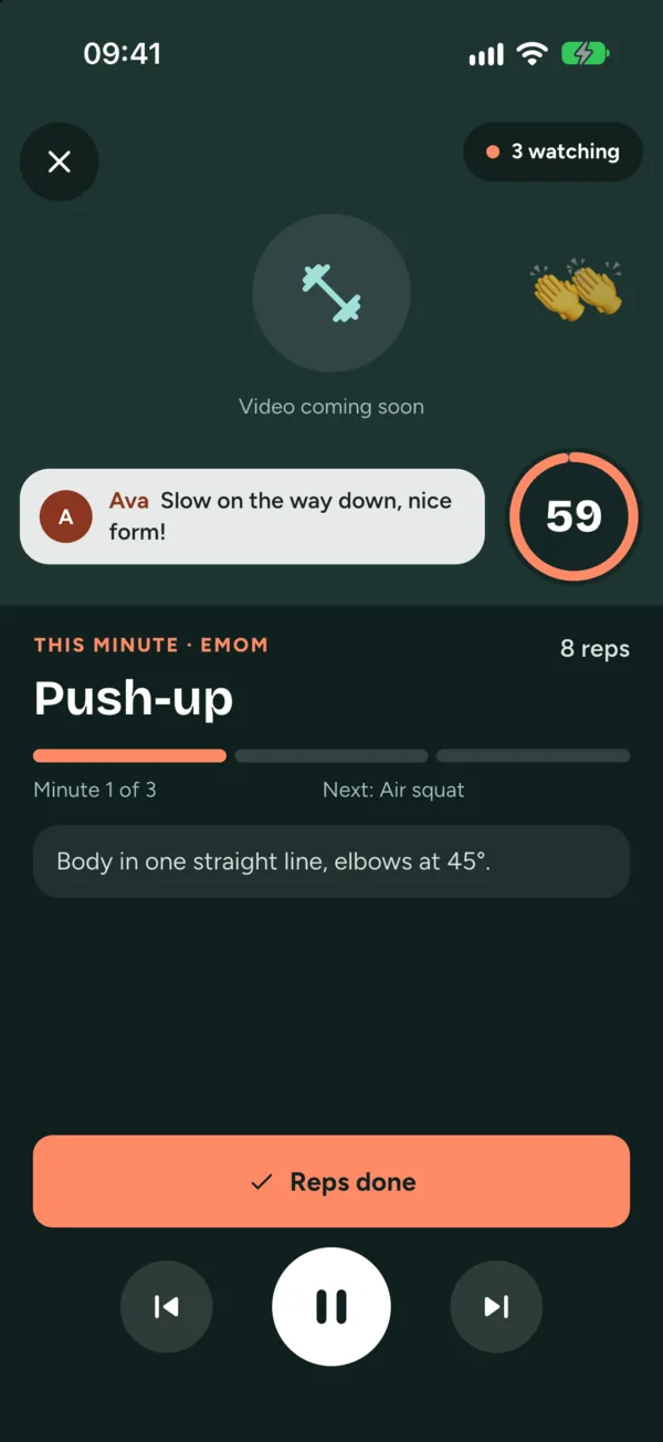 Push-ups in an EMOM block, with a cheer from coach Ava